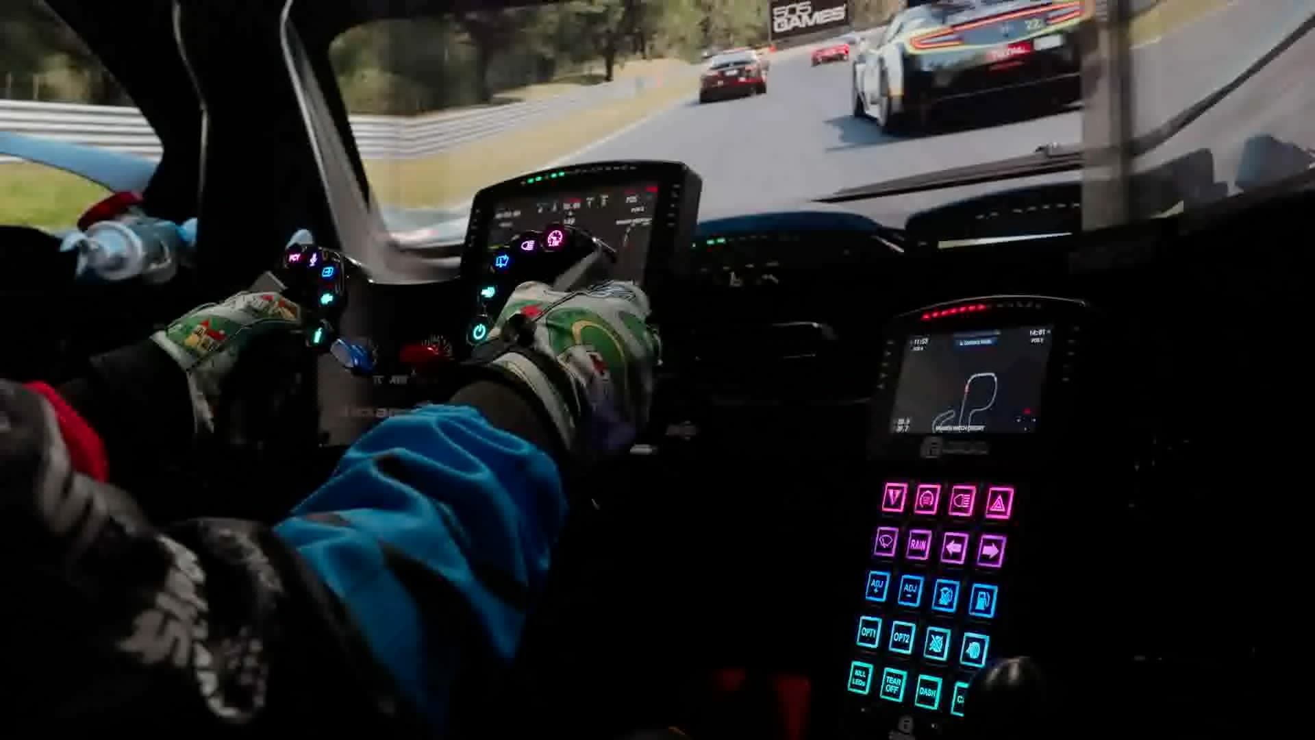 A driver's hands on a sim racing wheel during a session